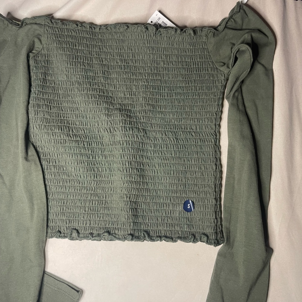 Brand new green off shoulder shirt